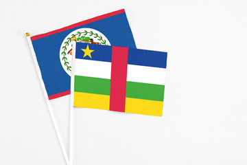 Central African Republic and Belize stick flags on white background. High quality fabric, miniature...