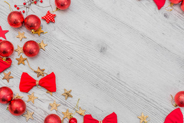 Christmas composition. red decorations on wooden background. Christmas, winter, new year handmade concept. Flat lay, top view, copy space. Free placefor text.