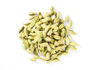 Handful spice Green Cardamom (Elettaria cardamomum) on a white background