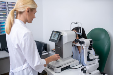 Screen showing eye of patient while eye doctor making examination