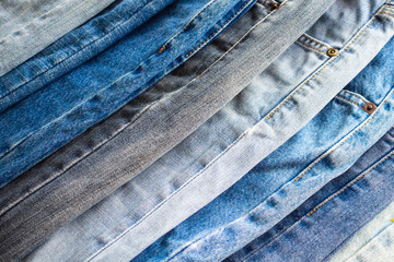 denim blue jeans stack texture background closeup