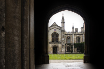 arch passage gate in old medieval castle college courtyard
