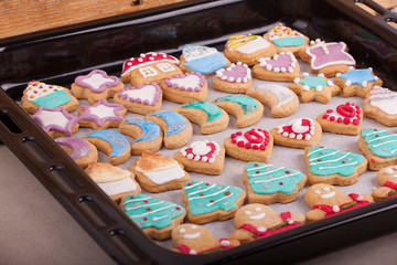 beautiful New Year and Christmas colorful cookies photographed on a wooden background