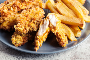 Chicken strips in cornflakes breadcrumb