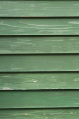 Fototapeta premium 緑色の木製の壁