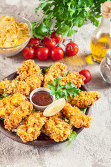 Chicken strips in cornflakes breadcrumb