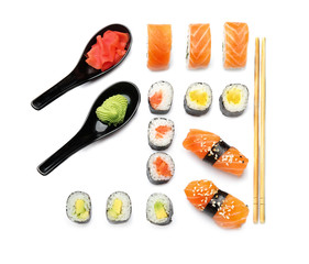Composition with different sushi on white background