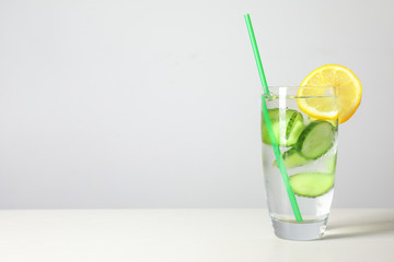 Glass of healthy infused water on table