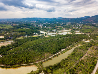 Fototapeta na wymiar Aerial photos of rural fields, rivers and ponds in mountainous areas of China