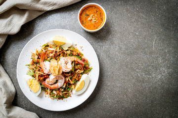 Wing Bean or Betel Nuts Spicy Salad with Prawns and Shrimps