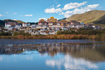 Fototapeta na wymiar Songzanlin Temple also known as the Ganden Sumtseling Monastery, is a Tibetan Buddhist monastery in Zhongdian city( Shangri-La), Yunnan province China and is closely Potala Palace in Lhasa
