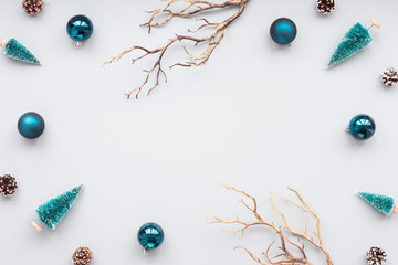 Christmas decoration on pastel blue background, flat lay, top view