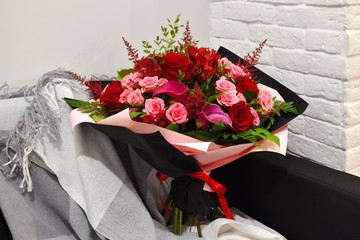 Blooming flower bouquet in a stylish package.