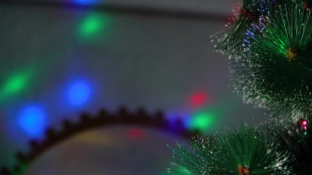 Red Christmas ball hanging on Christmas tree, vertical panorama camera