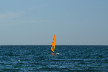 paradise coast windsurfing along the beach extreme sports and relaxation