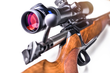 Detail of rifle telescope for sport hunting isolated on whute background. Hunting sniper gun,...