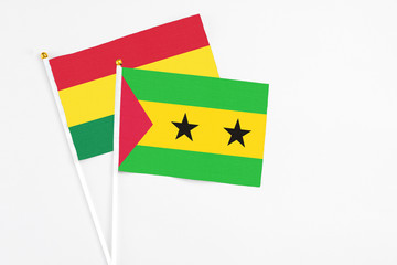 Sao Tome And Principe and Bolivia stick flags on white background. High quality fabric, miniature...