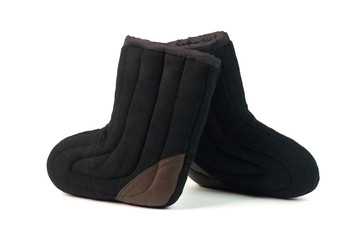 Russian traditional winter black boots-burki isolated on white background. Warm shoes for the elderly