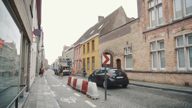 garbage car is cleaning the streets