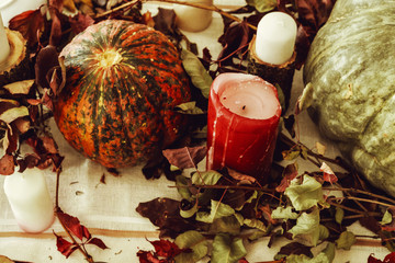 Beautiful autumn table decor with green pumpkin