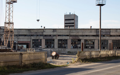 Old soviet industrial building. Grunge industrial landscape.