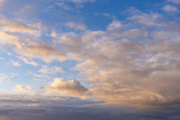 Naklejka na ściany i meble blue sky with white clouds at sunrise