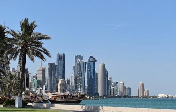 Fototapeta Picture of Doha West Bay a skyscraper forest with a sea front view.. 