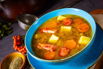 polish pea soup (grochowka) with smoked bacon and sausage