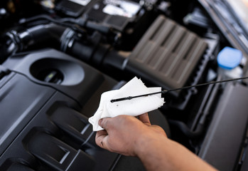 Picture of a man servicing the car