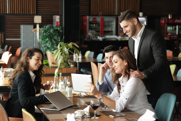 Group of good looking people having brunch