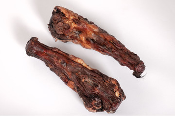 Two large dried oxtails. Could be used in exotic cuisine or as natural chew treats for big dogs....