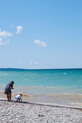 Mother and child at the beach