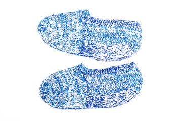 Woolen footsteps isolated on white background. Handmade knitwear.