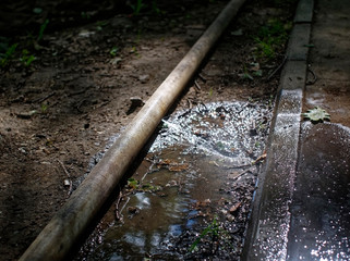 water trickle from the hole, fire hose.