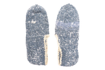 Woolen footsteps isolated on white background. Handmade knitwear.