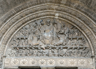 Tympanum of the facade in the Moissac Abbey decorated with sculptures of apostles and saints