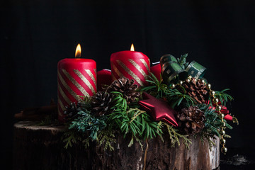 Advent candles on a black background