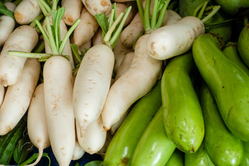 White radish and Green eggplant for sell in the fresh market.