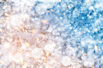 abstract christmas background with snow ice and lights