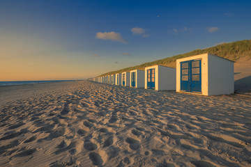 Beach Cabins And High Dunes With Grass At Texel Netherlands - obrazy, fototapety, plakaty