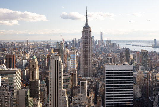 Fototapeta Midtown Manhattan, the Empire State Building and the Financial District as seen from Top of the Rock