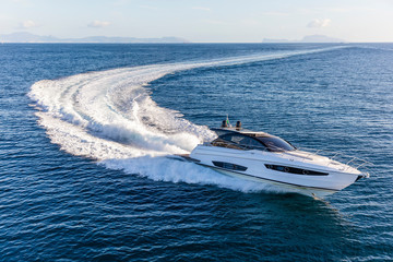 luxury motor yacht in navigation, aerial view - 302418884