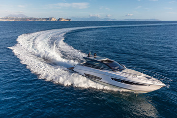 luxury motor yacht in navigation, aerial view - 302419289