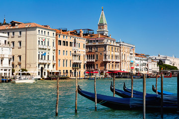 Obraz premium Panorama of Grand canal with boats and gondolas on sunny summer day in Venice. Italy