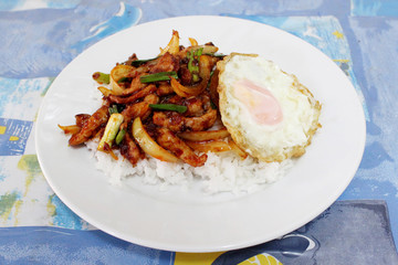 Rice with stir-fried pork with chilli paste and sunny up on top