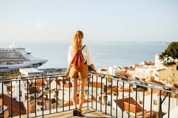 Young woman exploring Lisbon