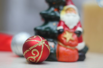 Bright colorful Christmas-tree decorations in white and red tones create a fabulous sensation of Christmas and New Year.