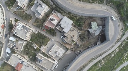 Aerial footage of the separation wall between Israel and the Palestinian Authority in Jerusalem