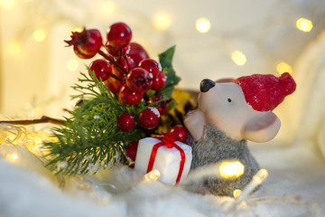Obraz premium Christmas decor with spruce branch and the symbol of the year, rat, mouse