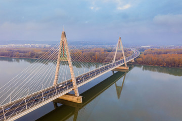 Budapest, Hungary - Aerial drone view of Megyeri Bridge, the biggest bridge of Budapest on an autumn morning